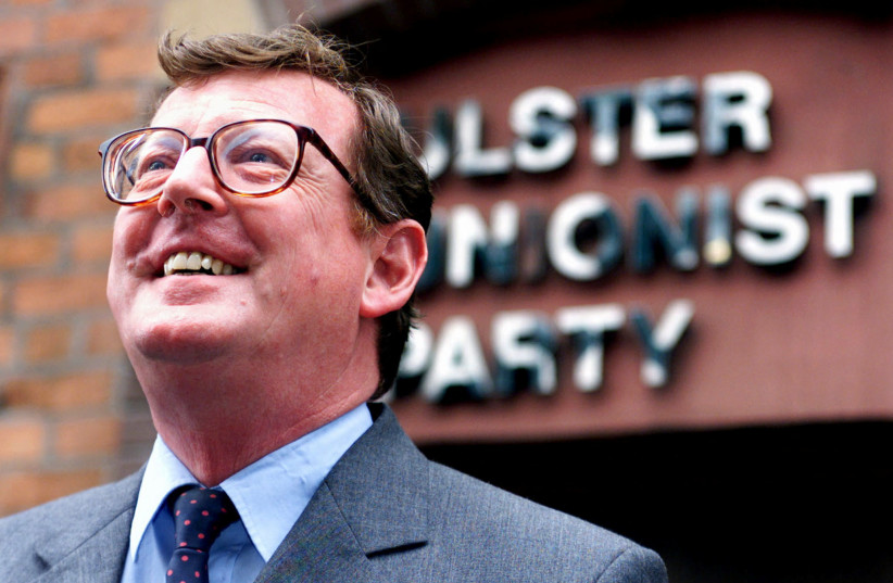 Ulster Unionist Party leader David Trimble smiles after a meeting held with his party in UUP Headquarters in Belfast city center. (photo credit: REUTERS/FILE PHOTO)
