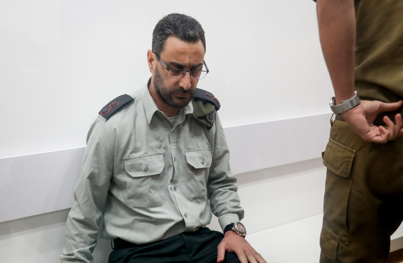  Dan Sharoni, an IDF officer accused of sexual offenses arrives for a court hearing at a military court in Beit Lid, July 24, 2022.  (credit: FLASH90)