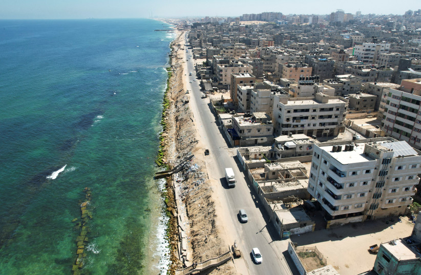  A general view of Beach refugee camp showing the erosion of the shore and new vertical wave breakers placed inside the sea in Gaza City July 26, 2022. (photo credit: REUTERS/MOHAMMED SALEM)