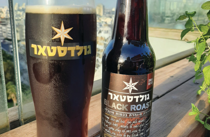  ENJOYING A glass of Goldstar at the Carlton Hotel, Tel Aviv, overlooking the Mediterranean Sea. (credit: Tempo)