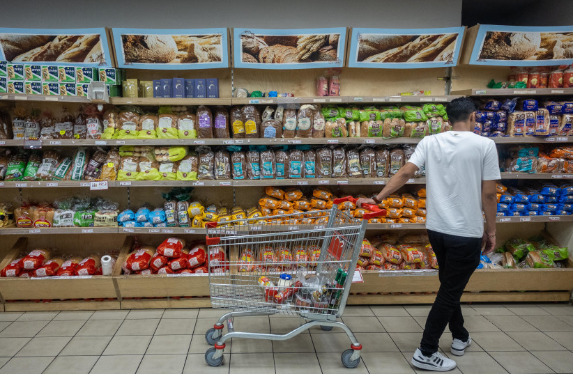  Bread for sale at the Rami Levy supermarket in Jerusalem on July 17, 2022 (credit: YONATAN SINDEL/FLASH90)