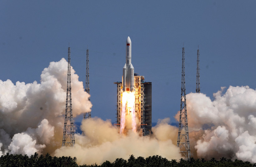  A Long March-5B Y3 rocket, carrying the Wentian lab module for China's space station under construction, takes off from Wenchang Spacecraft Launch Site in Hainan province, China July 24, 2022. (photo credit: CHINA DAILY VIA REUTERS)