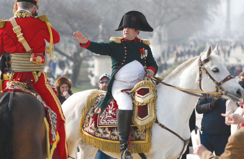  WHAT WOULD Napoleon say: 2015 reenactment of the emperor’s return to Paris after nine months of exile on Elba. (photo credit: CHARLES PLATIAU/REUTERS)