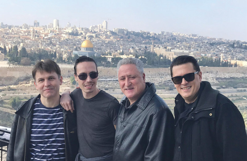  RAY GELATO (second from right) and members of his band pose, overlooking Jerusalem’s Old City. (photo credit: Ray Gelato)