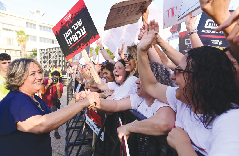  YAFFA BEN-DAVID, head of the Teachers’ Union, greets teachers participating in a demonstration in Tel Aviv in May demanding better pay and work conditions. (credit: TOMER NEUBERG/FLASH90)