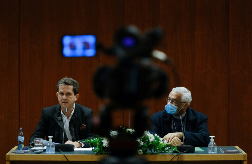   Portuguese psychiatrist Pedro Strecht and the President of Portugal's Bishops' Conference (CEP) Jose Ornelas announce the members of the investigative commission into historical child sexual abuse on in Lisbon on December 2, 2021. (credit: REUTERS)