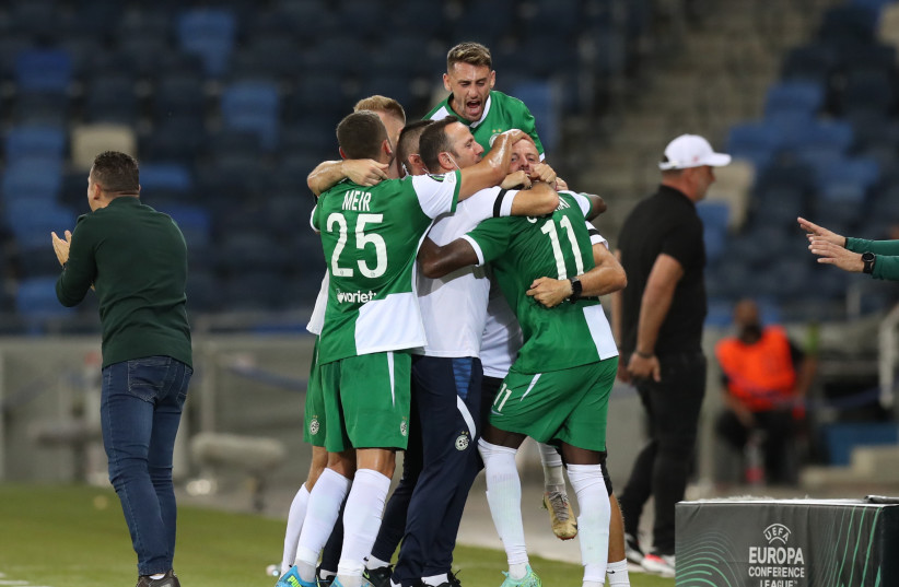 MACCABI HAIFA players had plenty to celebrate this week after beating host Olympiacos 4-0 in their Champions League second-leg duel to move on to the third qualifying round with a 5-1 aggregate victory (photo credit: RONEN ZVULUN/REUTERS)