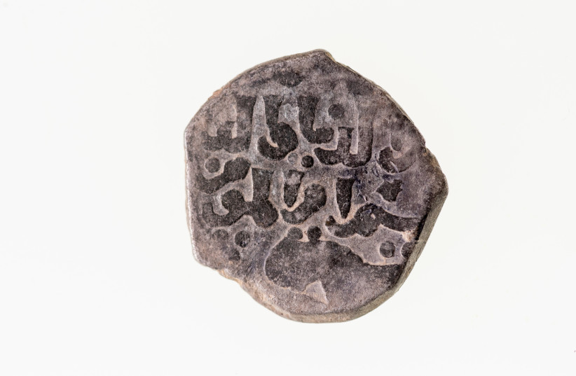  Mamluk silver coin minted in Cairo under the rule of Baibars found at Tel Tibneh (credit: SHAHAR COHEN)