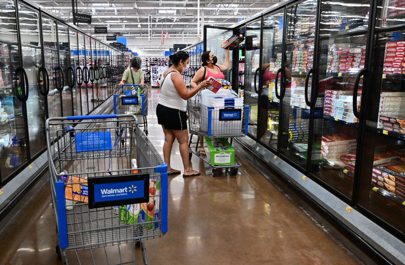 People shop for frozen food at a store in Rosemead, California, on June 28, 2022. (photo credit: FREDERIC J. BROWN/AFP VIA GETTY IMAGES/TNS)