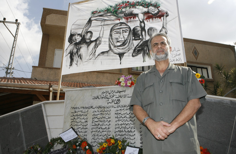 Former MK Ibrahim Sarsur stands by a memorial monument to the t Kafr Qasim massacre during a meeting of The Citizens Accord Forum between Jews & Arabs in Israel, October 28, 2007 (credit: MICHAL FATTAL/FLASH90)