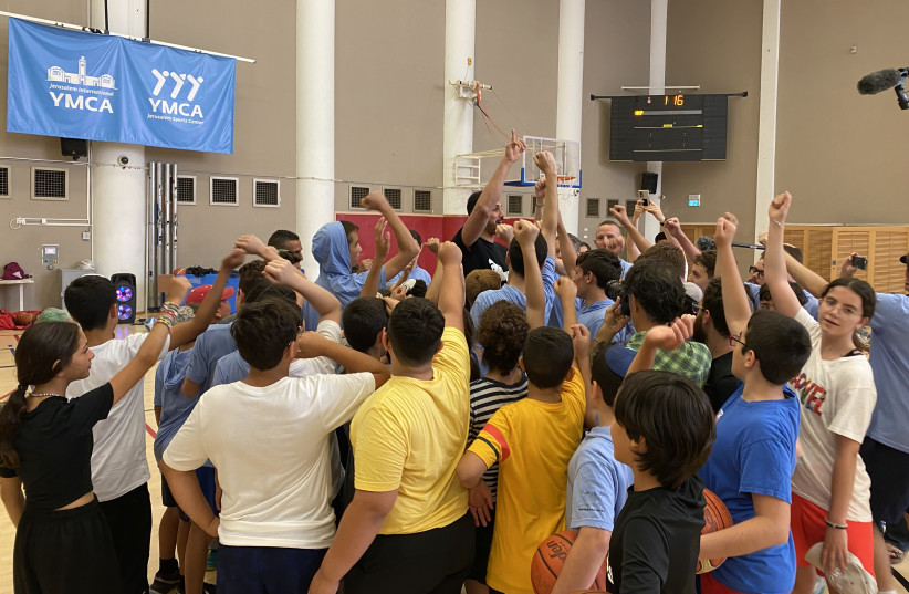  Enes Kanter Freedom is seen meeting with kids at his basketball camp at the YMCA in Jerusalem. (credit: SETH J. FRANTZMAN)