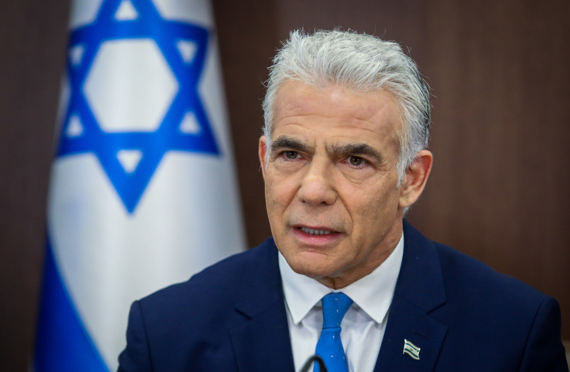  Prime Minister Yair Lapid leads a cabinet meeting at the Prime Minister's office in Jerusalem on July 31, 2022.  (photo credit: MARC ISRAEL SELLEM/THE JERUSALEM POST)
