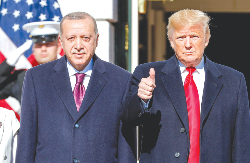  THEN-president Donald Trump welcomes Turkey’s President Recep Tayyip Erdogan to the White House in 2019. In an apparent deal with Erdogan, Trump withdrew US troops from the Turkish-Syrian border area days before Erdogan launched his attack, says the writer (photo credit: TOM BRENNER/REUTERS)