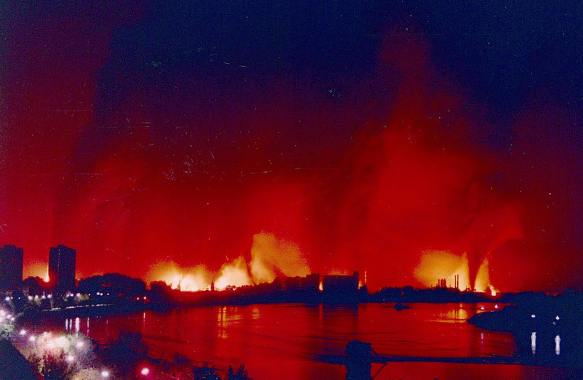  Burning NIS oil refinery in Novi Sad during the 1999 NATO bombing of Yugoslavia. (credit: Wikimedia Commons)