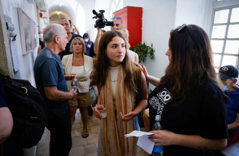  Kim Ariel Arad who is one of the alleged victims of Yuval Carmi seen prior to a hearing against Carmi at the Magistrate's Court in  Jerusalem, June 29, 2022.  (credit: OLIVIER FITOUSSI/FLASH90)