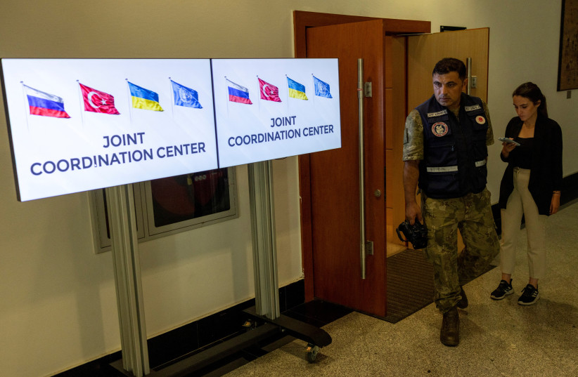 A military officer leaves a news conference at The Joint Coordination Centre hours after the first ship to carry Ukrainian grain through the Black Sea, since Russia invaded Ukraine five months ago, left the port of Odesa for Lebanon in Istanbul, Turkey, August 2, 2022. (credit: REUTERS/UMIT BEKTAS)
