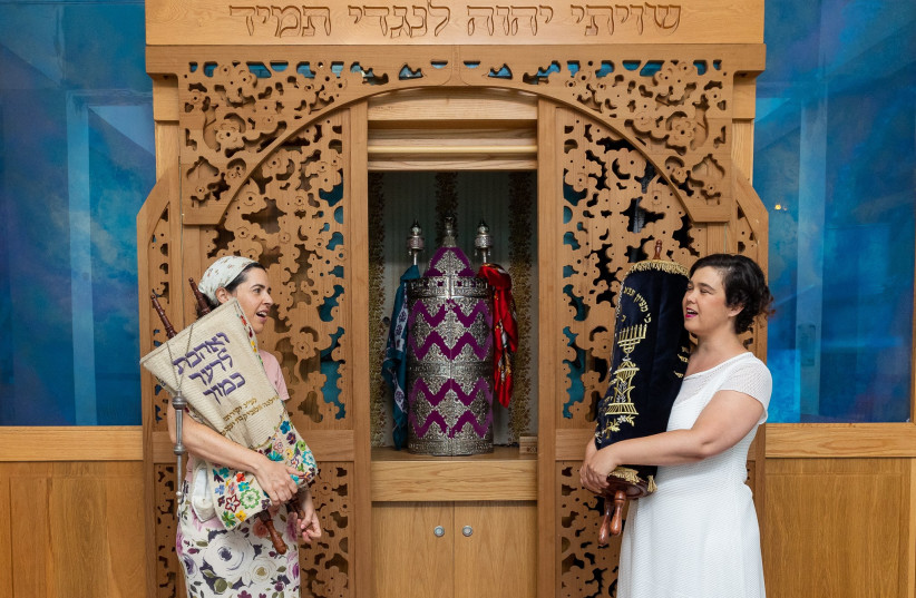  MANY WOMEN around the world take on active roles in synagogue prayer services.  (credit: Dor Sebag)