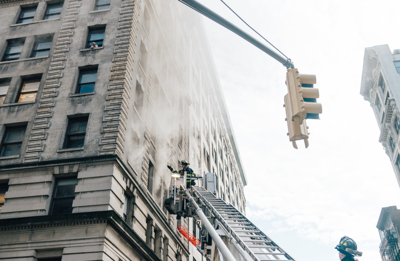  ‘SKYSCRAPER EXPLODES into Flames as Midtown New York Rocks in Blast’ was the July 1945 headline.  (photo credit: Matthew LeJune/Unsplash)