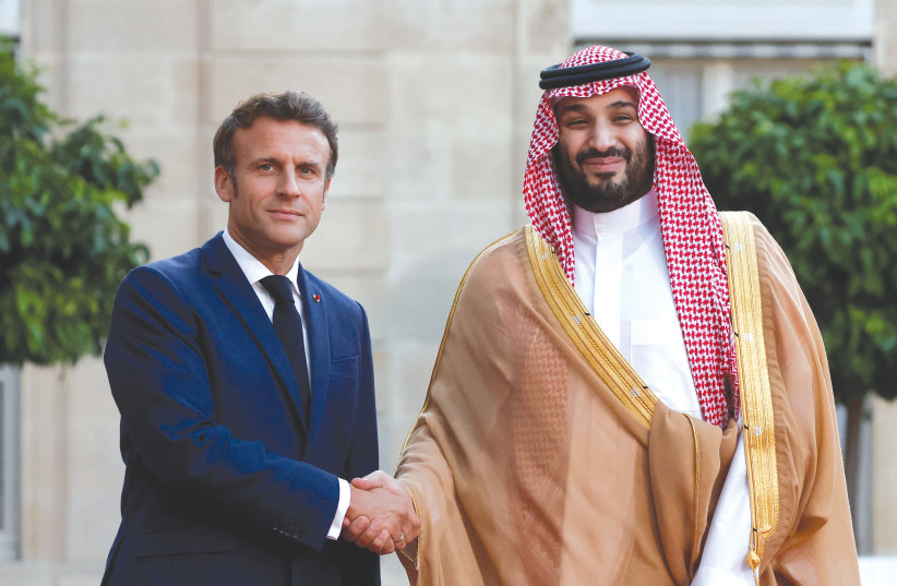  FRENCH PRESIDENT Emmanuel Macron welcomes Saudi Crown Prince Mohammed bin Salman for a working dinner at the Elysee Palace in Paris, last week.  (photo credit: BENOIT TESSIER/REUTERS)
