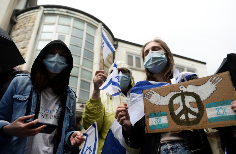  Pro-Israel supporters take part in a protest in Brussels, Belgium May 16, 2021 (photo credit: REUTERS/Johanna Geron)