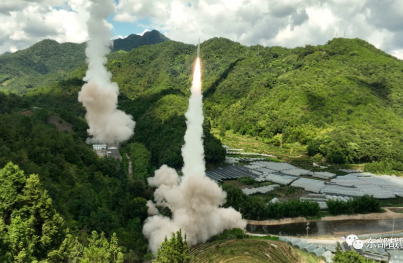 The Rocket Force under the Eastern Theatre Command of China's People's Liberation Army (PLA) conducts conventional missile tests into the waters off the eastern coast of Taiwan, from an undisclosed location in this handout released on August 4, 2022. (credit: Eastern Theatre Command/Handout via REUTERS)
