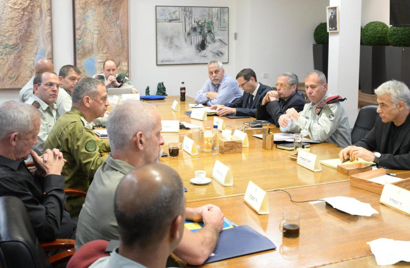  Prime Minister Yair Lapid leads a situational assessment amid tensions in Gaza, August 8, 2022 (photo credit: AMOS BEN-GERSHOM/GPO)