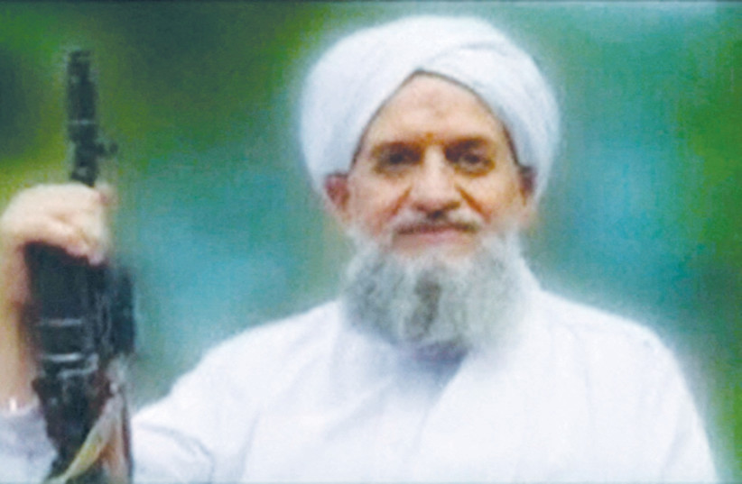  A PHOTO of Ayman al-Zawahiri is seen in this still image taken from a video released in 2011. (credit: REUTERS TV)