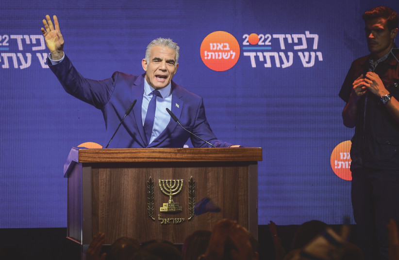  ‘WE BEAT the machine of incitement and poison four times, and we’re going to beat it again for the fifth time,’ Lapid said, driving his adoring fans wild with chants of: ‘Hoo-ha, Yesh Atid, Prime Minister Yair Lapid.’ It rhymed in Hebrew, too. (photo credit: AVSHALOM SASSONI/FLASH90)