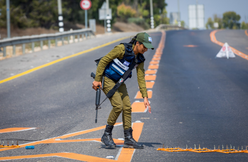  Israeli soldiers and police block roads near the border with the Gaza Strip on August 4, 2022.  (photo credit: FLASH90)