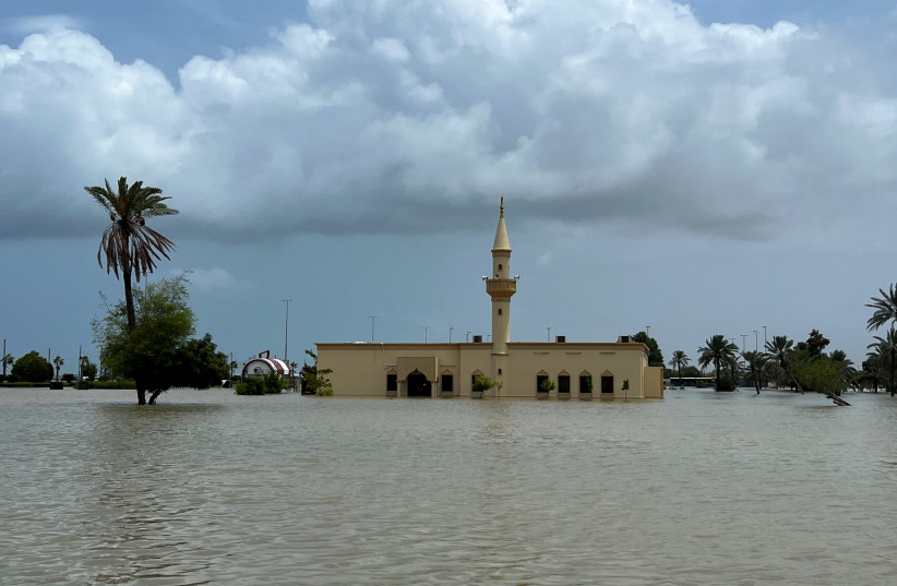  General view of flood water following a day of heavy rain in Fujairah, United Arab Emirates, July 28, 2022. (photo credit: REUTERS/ABDEL HADI RAMAHI)
