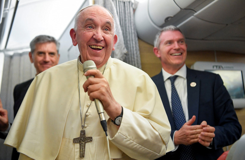  Pope Francis holds a news conference aboard the papal plane on his flight back after visiting Canada, July 29, 2022.  (photo credit: REUTERS)