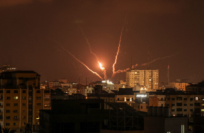  A picture taken on August 5, 2022, shows Palestinian rockets fired from Gaza City in retaliation to earlier Israeli airstrikes. (photo credit: MAHMUD HAMS/AFP via Getty Images)