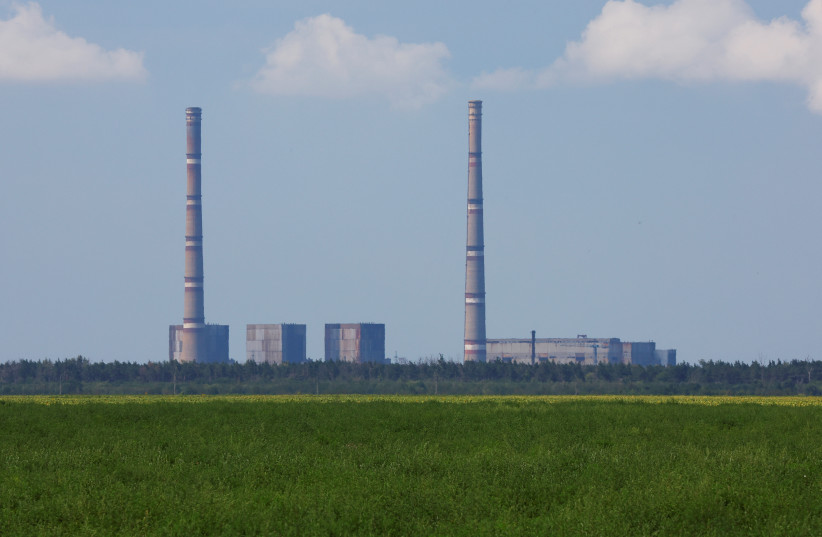 A view shows the Zaporizhzhia thermal power plant in the course of Ukraine-Russia conflict outside the Russian-controlled city of Enerhodar in the Zaporizhzhia region, Ukraine, August 4, 2022. (credit: REUTERS/ALEXANDER ERMOCHENKO)