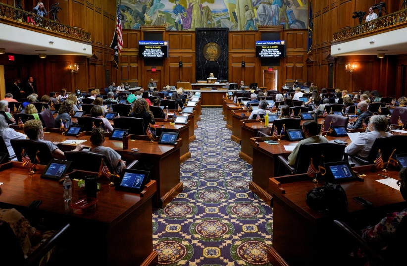 State lawmakers and members of the public gather in the Indiana House of Representatives for a special session to debate banning abortion in Indianapolis, Indiana, US, August 2, 2022. (photo credit: REUTERS/Cheney Orr)