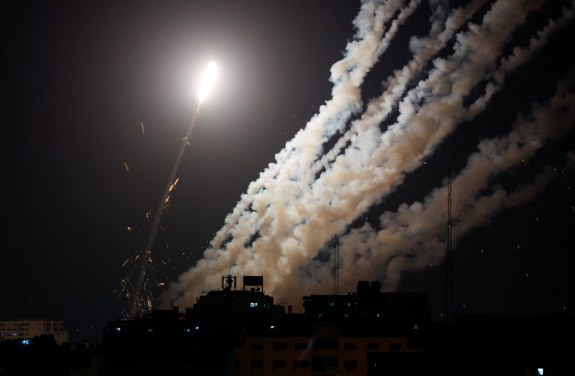  Rockets are fired by Palestinian militants into Israel, amid Israel-Gaza fighting, in Gaza August 6, 2022.  (credit: REUTERS/IBRAHEEM ABU MUSTAFA)