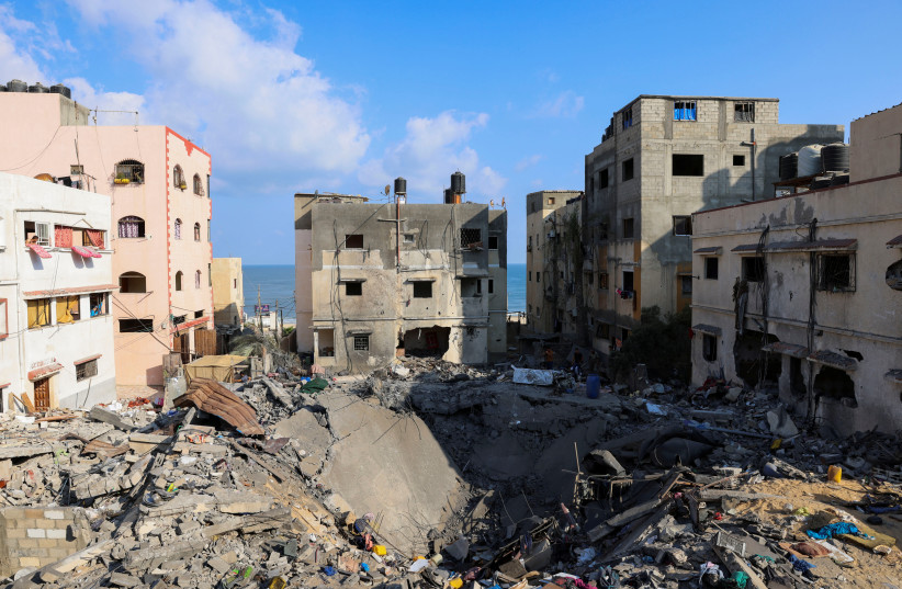 A view of houses that were damaged during Israel-Gaza fighting, as ceasefire holds, in Gaza City August 8, 2022. (photo credit: REUTERS/SUHAIB SALEM)