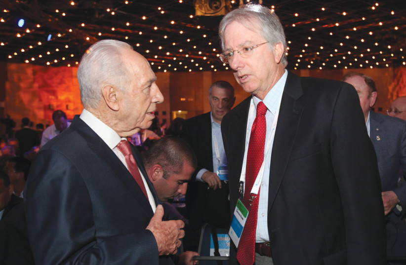  THEN-PRESIDENT Shimon Peres speaks with US envoy and peace negotiator Dennis Ross in Jerusalem, in 2011. (photo credit: YOSSI ZAMIR/FLASH90)