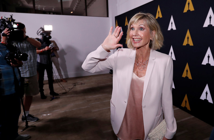  Cast member Olivia Newton-John attends a 40th anniversary screening of "Grease" at the Academy of Motion Picture Arts and Sciences in Beverly Hills, California, US, August 15, 2018.  (photo credit: REUTERS/MARIO ANZUONI)