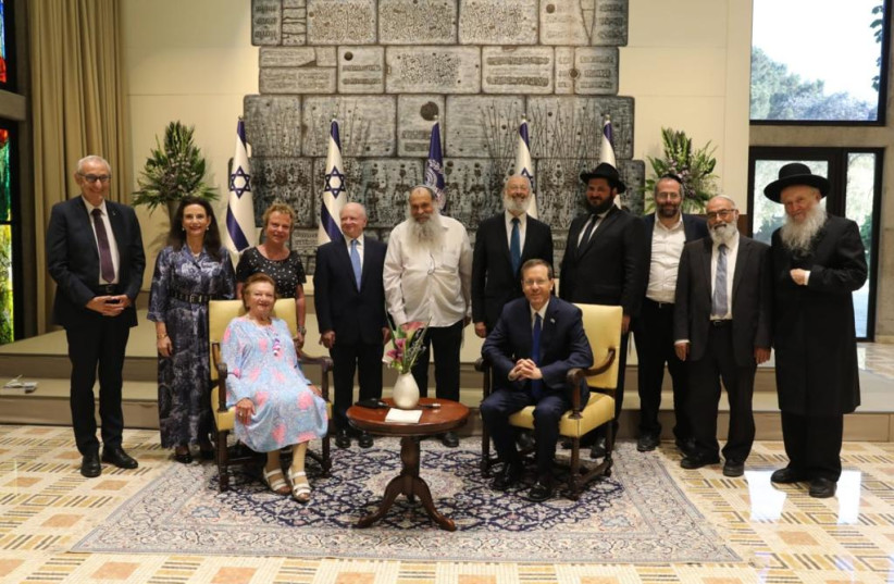  President Isaac Herzog with the Chabad shluchim. (credit: GPO)