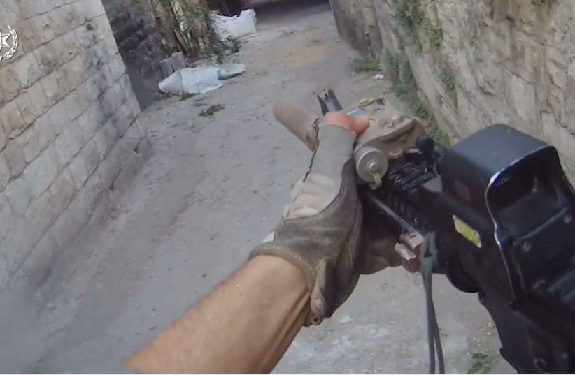 Screenshot from combat footage of Yamam commandos on a mission in Nablus to stop the terrorist  Ibrahim al-Nabulsi (credit: ISRAEL BORDER POLICE SPOKESMAN)