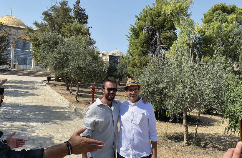  POLICE ASK the writer and his son to refrain from taking a photograph during their visit to the Temple Mount, on Sunday. (photo credit: GIL TROY)