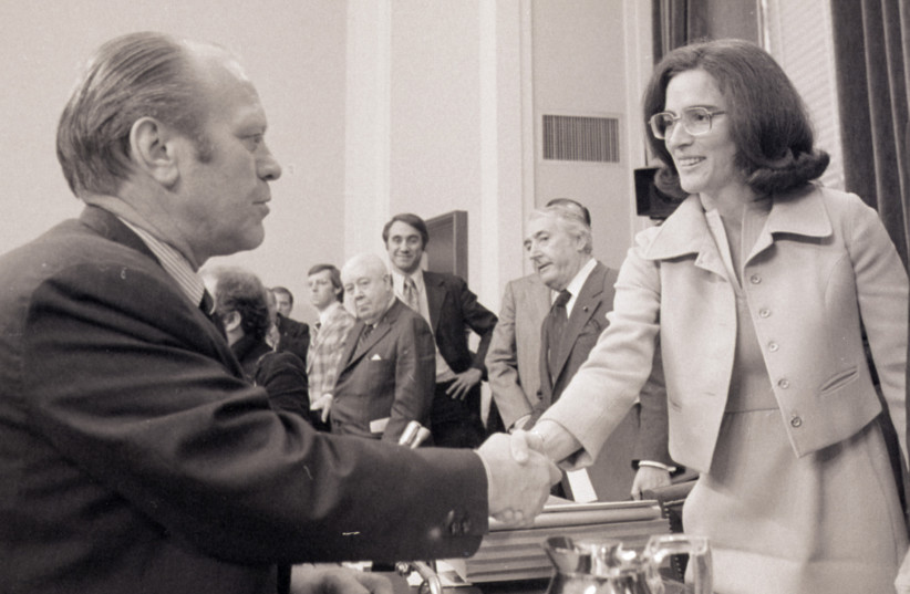  Former President Ford shakes hands with Former Representative Elizabeth Holtzman in 1974 after Ford completed his testimony to the House Judiciary subcommittee on his reasons for granting a pardon to former President M. Nixon. (credit: GETTY IMAGES/JTA)