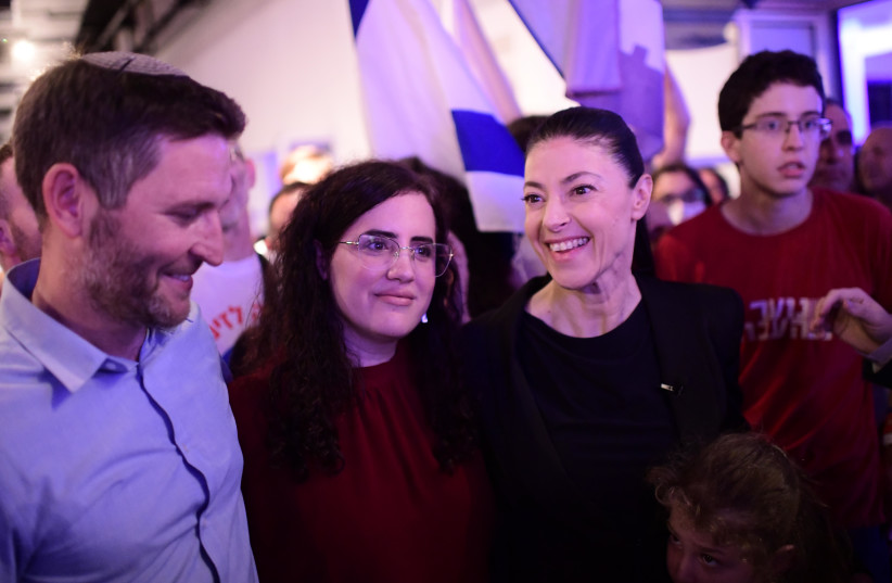  Labor leader and Transportation Minister Merav Michaeli with Labor party Mk Naama Lazimi and Yaya Fink after the results were announced in the Labor party primary elections, in Tel Aviv, August 9, 2022.  (photo credit: TOMER NEUBERG/FLASH90)