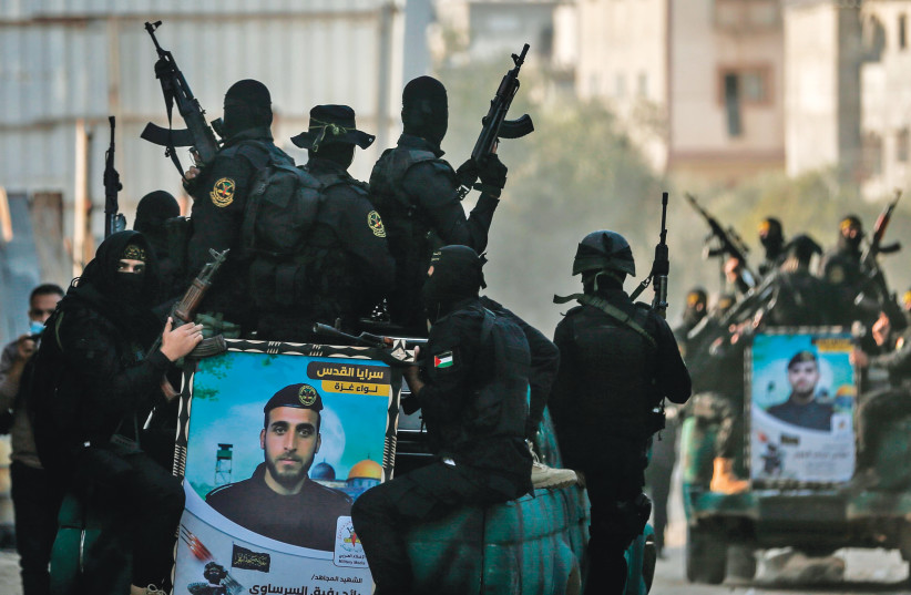  ISLAMIC JIHAD members mark the first anniversary of the killing of the group’s commander Baha Abu al-Ata in an IDF missile strike on his home, in Gaza City, November 12, 2020. (credit: MAHMUD HAMS/AFP via Getty Images)