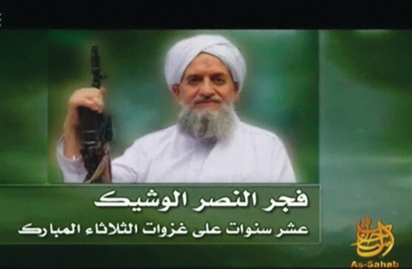  ELIMINATED AL QAIDA leader Ayman al-Zawahiri in a still from a 2011 video.  (photo credit: SITE Monitoring Service via Reuters TV)
