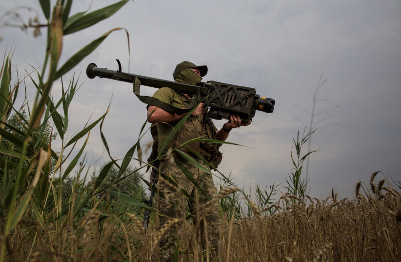  A Ukrainian serviceman holds a Stinger anti-aircraft missile at a position in a front line in Mykolaiv region, as Russia's attack on Ukraine continues, Ukraine August 11, 2022. (credit: REUTERS/ANNA KUDRIAVTSEVA)