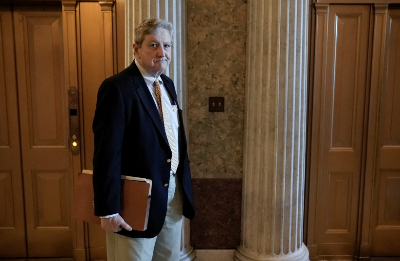  US Senator John Kennedy (R-LA) departs the Senate floor following a vote to proceed to the Inflation Reduction Act on Capitol Hill in Washington, DC, US August 6, 2022.  (photo credit: KEN CEDENO/REUTERS)