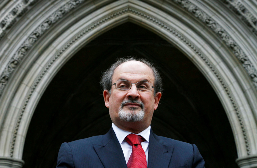  FILE PHOTO: Author Salman Rushdie arrives at the High Court to settle a libel action brought against Ron Evans local media reported, in London August 26, 2008. (photo credit: REUTERS/LUKE MACGREGOR/FILE PHOTO)