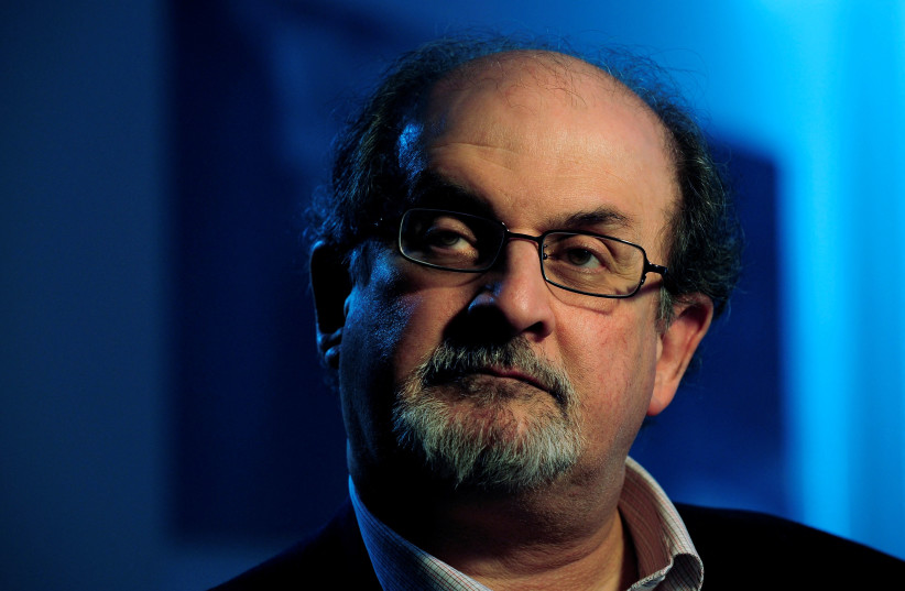 British author Salman Rushdie listens during an interview with Reuters in London, April 15, 2008. (credit: REUTERS/DYLAN MARTINEZ/FILE PHOTO)