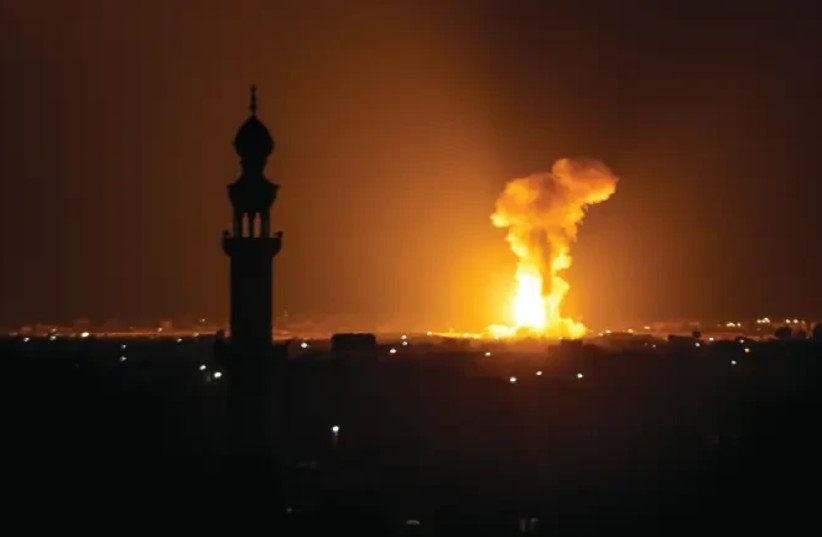 Israeli bombing in Khan Yunis (photo credit: ABED RAHIM KHATIB/FLASH 90)